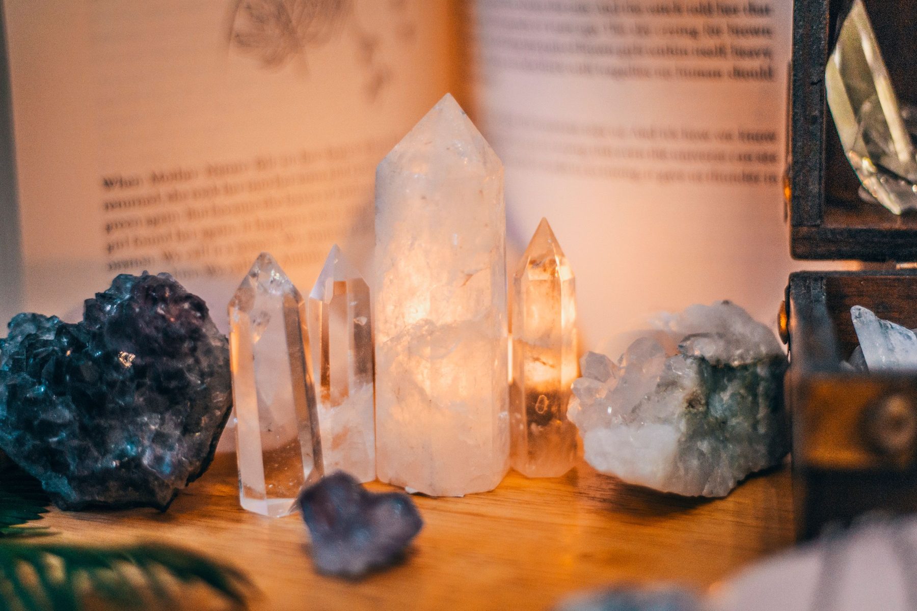 Healing crystals in warm candlelight